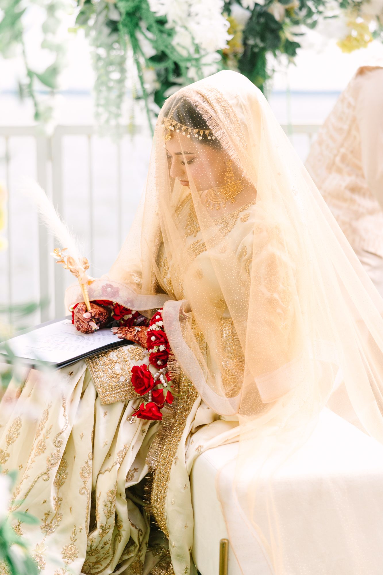 Bride signing, by Villa Productions